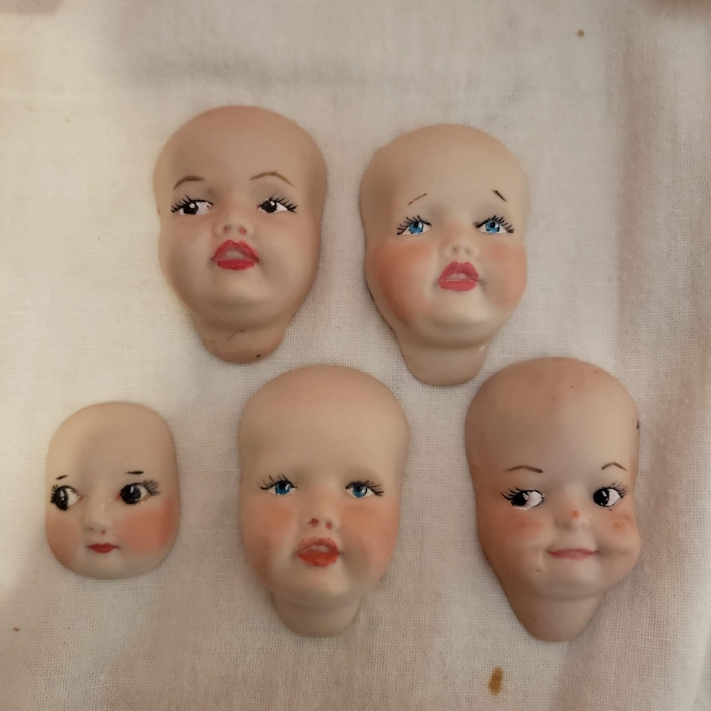 Lot of 4 Different Vintage Hand painted Porceain Baby Doll Heads